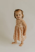 Load image into Gallery viewer, The Henley Tank Dress features a scoop back neck, gathered skirt, a functional button placket.   Fit: true to size  Features: scoop back neck, gathered skirt  Fabric: 95% bamboo 5% spandex jersey  Care: wash with like colors, gentle detergent, cool water, for best results lay flat to dry
