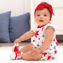 Load image into Gallery viewer, Baby girl bubble romper with stars print in red, white &amp; blue! She&#39;ll be outfitted cute and comfy in this super-soft 100% cotton rib material. Buttons at back and snaps underneath for easy on and off.  Complete the look by adding optional headwear. Machine Wash Gentle. Tumble Dry Low.
